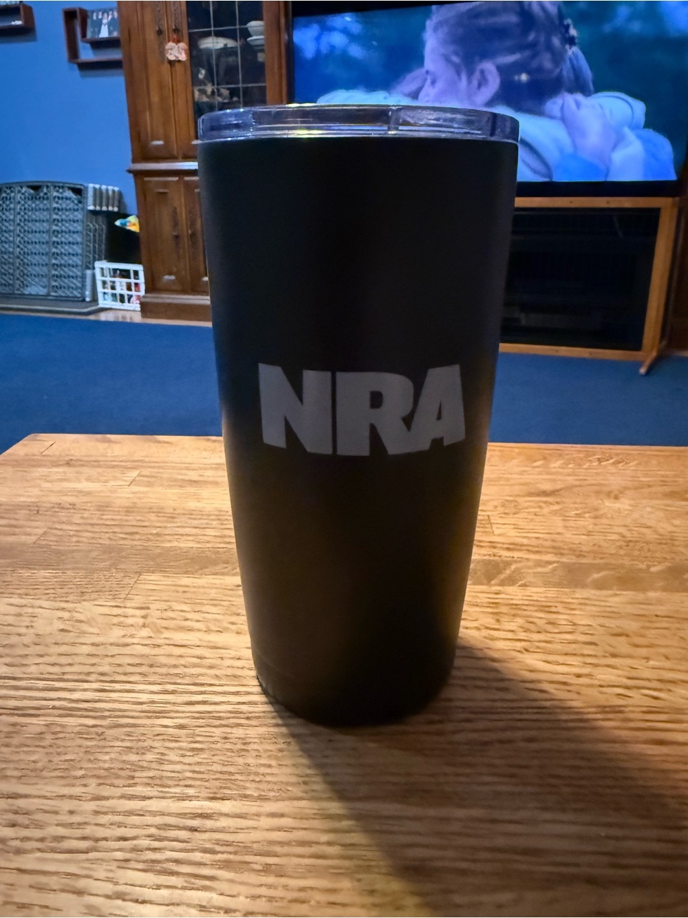 black, double-walled stainless steel NRA Tumbler  classic gray block-letter logo